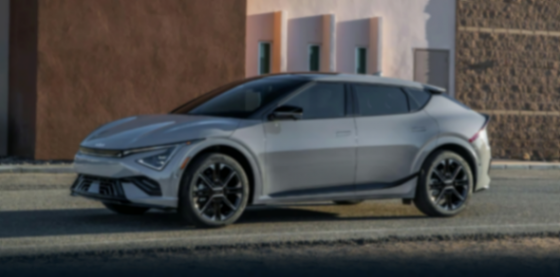 国际车企电动化退潮：700亿美元减值背后，谁在踩刹车？